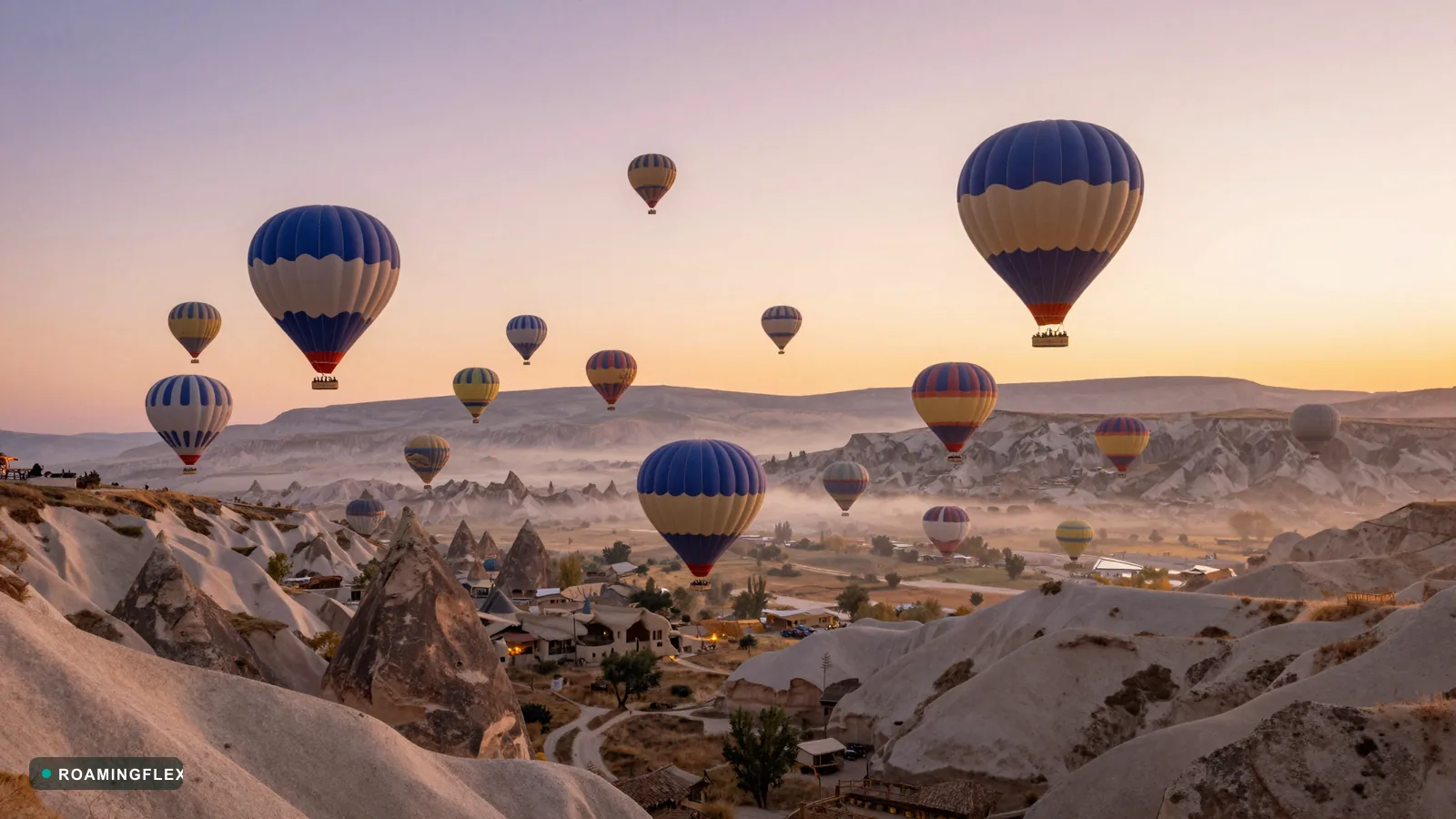 Hot-air balloons over Cappadocia at sunrise, Turkey